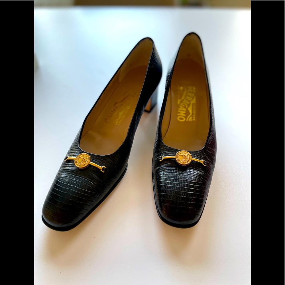 Immaculate Ferragamo black lizard leather pumps. 4A width
